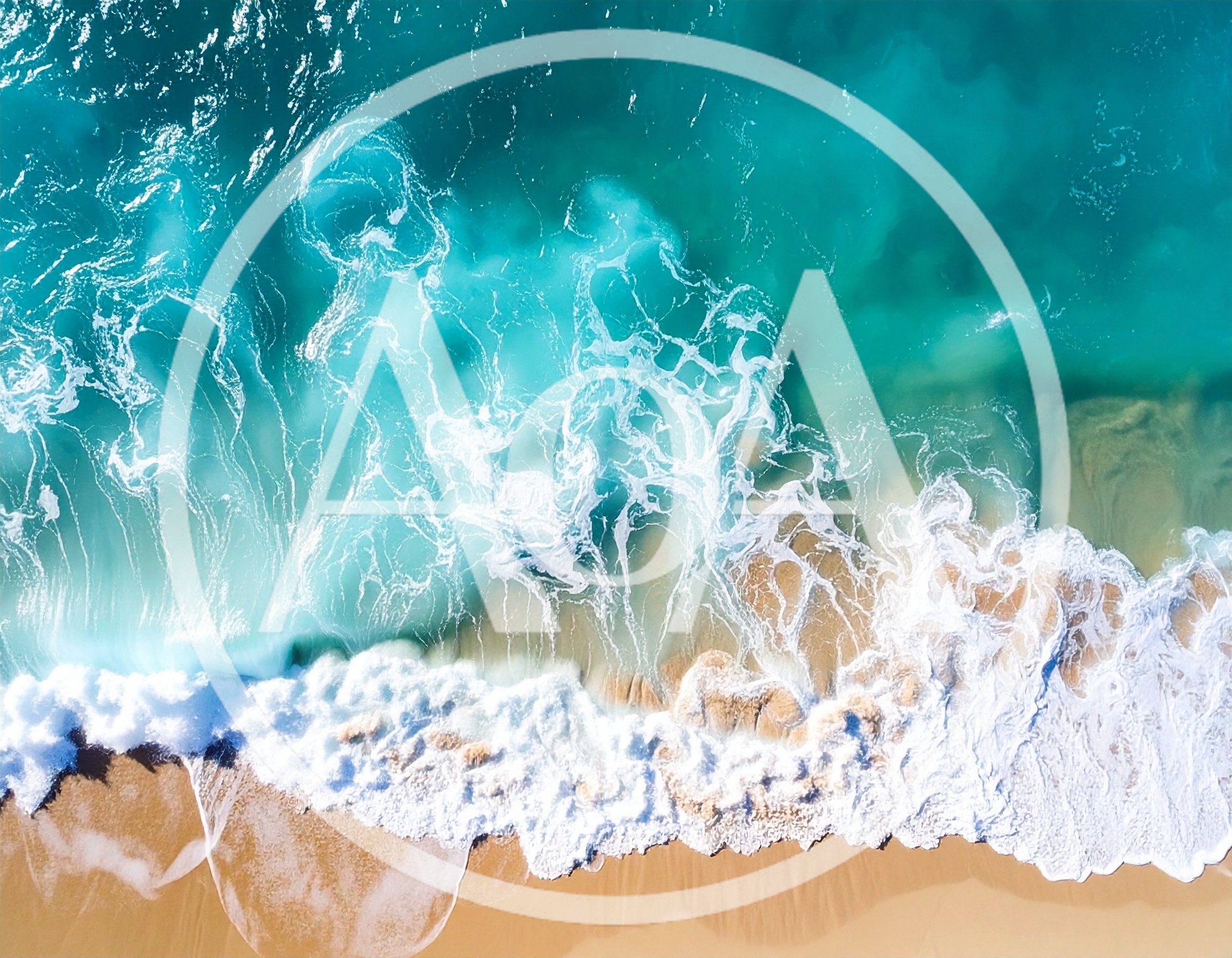 Aerial View Of Turquoise Ocean Waves Crashing On Beach