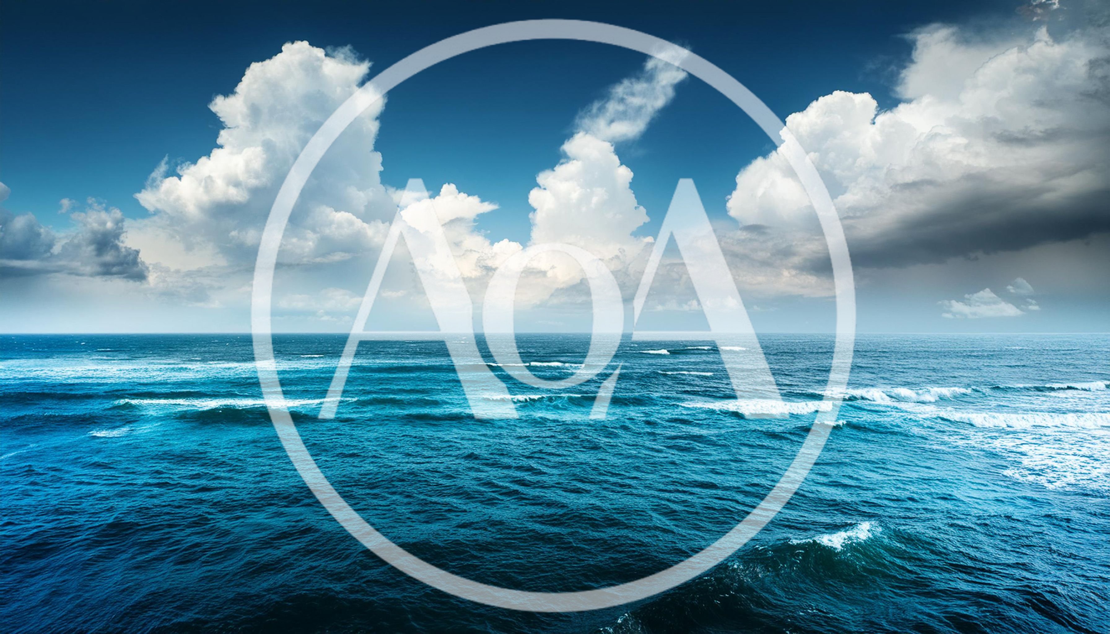 Vast Blue Ocean Waves Under Dramatic Cloudy Sky