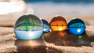 Four Glass Spheres Reflecting Beach Landscape