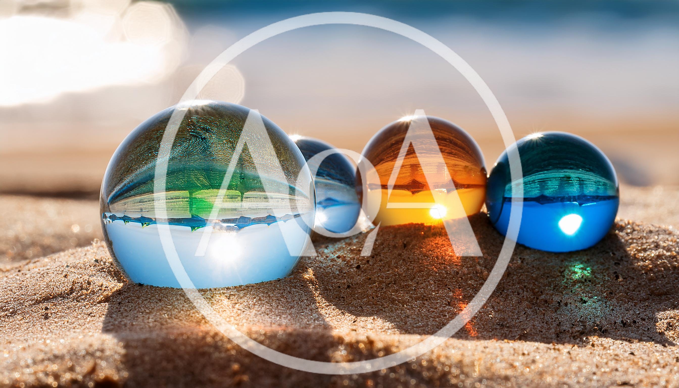 Four Glass Spheres Reflecting Beach Landscape