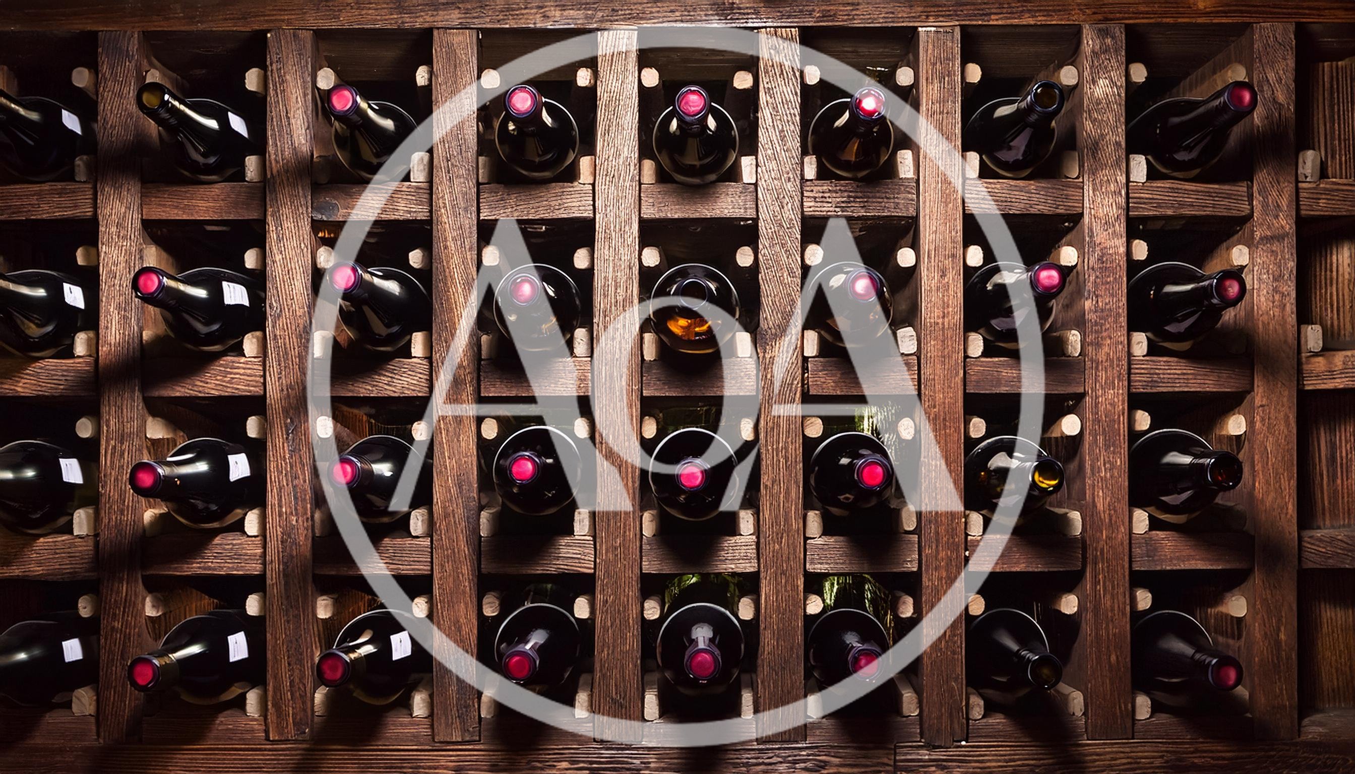 Wine Bottles Stored In A Wooden Rack