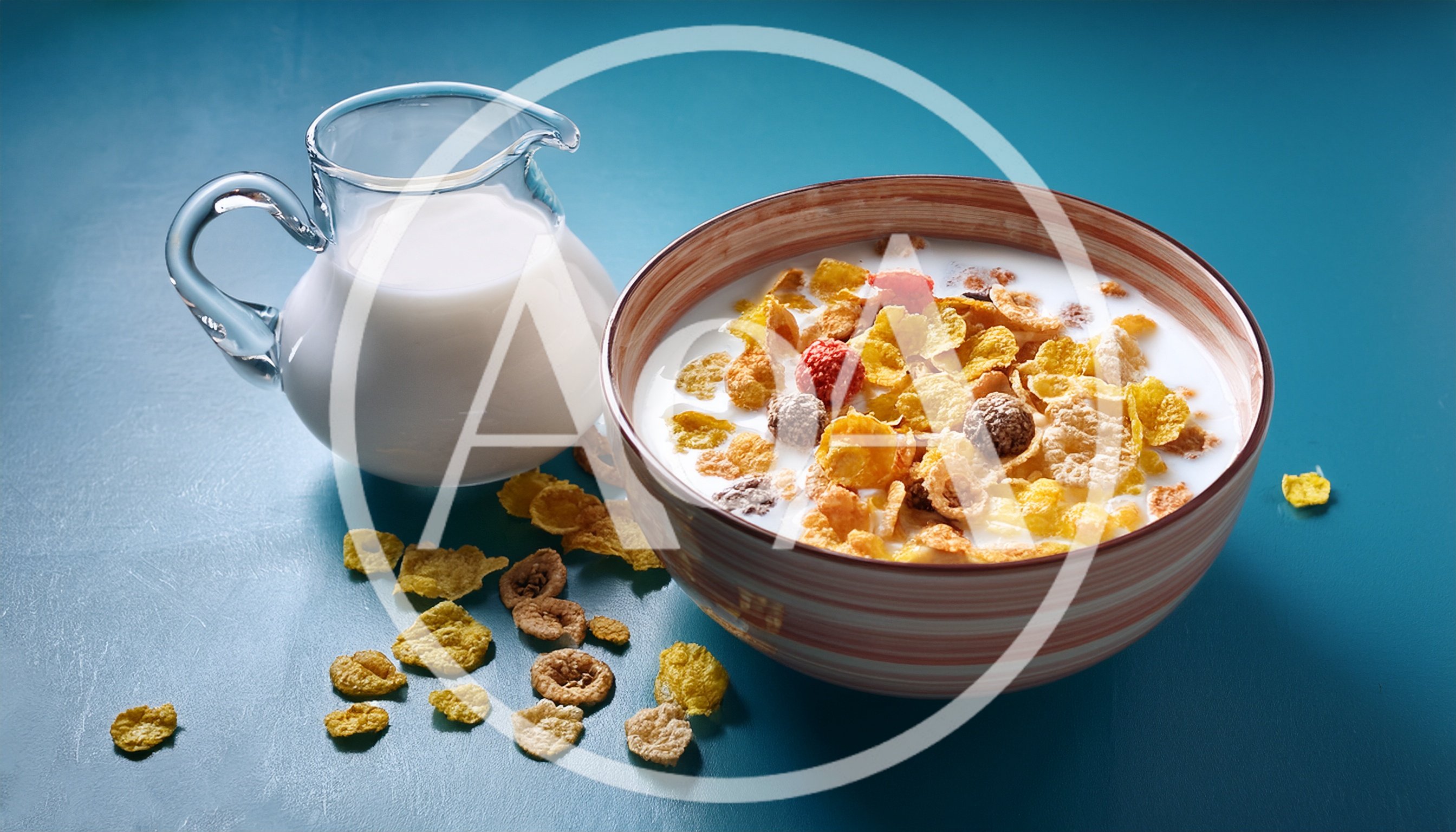Bowl of Cereal with Milk Pitcher
