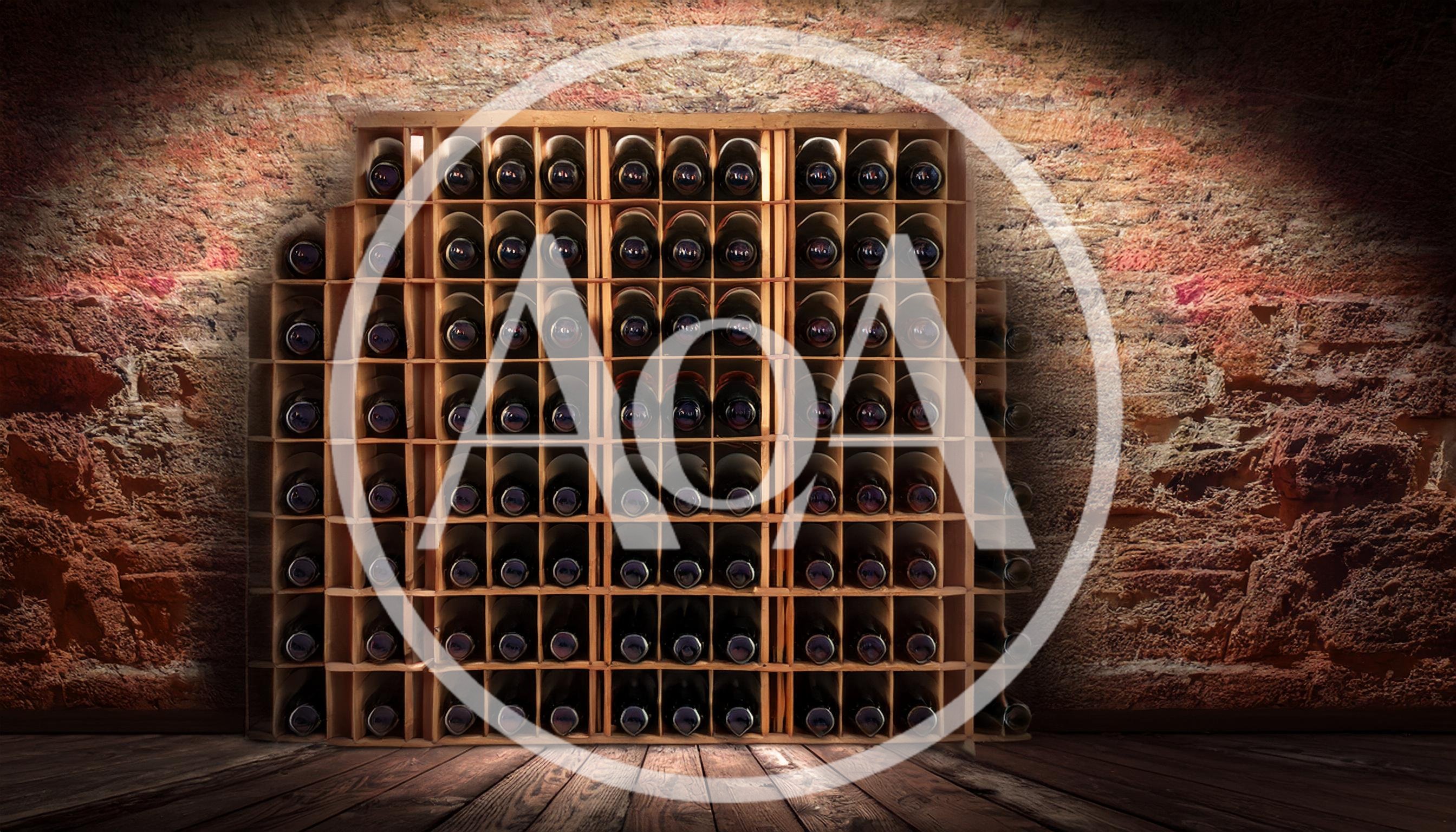Wine Bottles Stored In A Rustic Wooden Rack