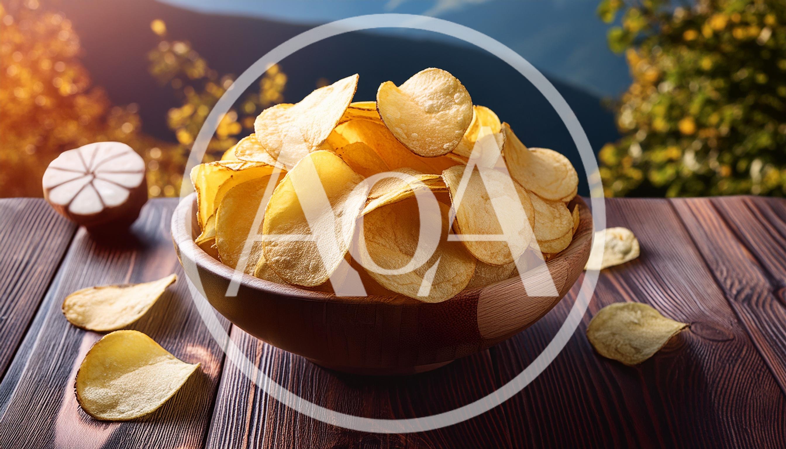 Bowl Of Crispy Potato Chips On Wooden Table