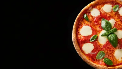 Fresh Margherita Pizza With Basil Leaves On Black Background