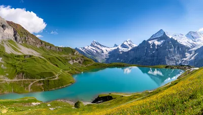 Bachalpsee Lake With Wetterhorn Mountain Peaks In Switzerland