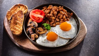 Traditional English Breakfast With Eggs Beans And Toast