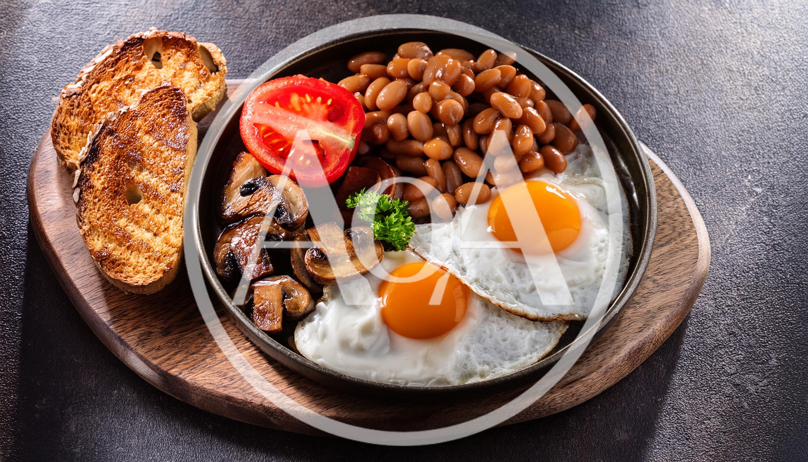 Traditional English Breakfast With Eggs Beans And Toast