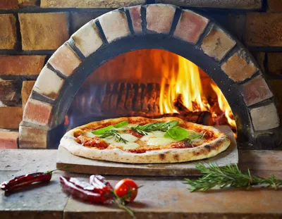 Fresh Margherita Pizza Baking In A Wood Fired Oven