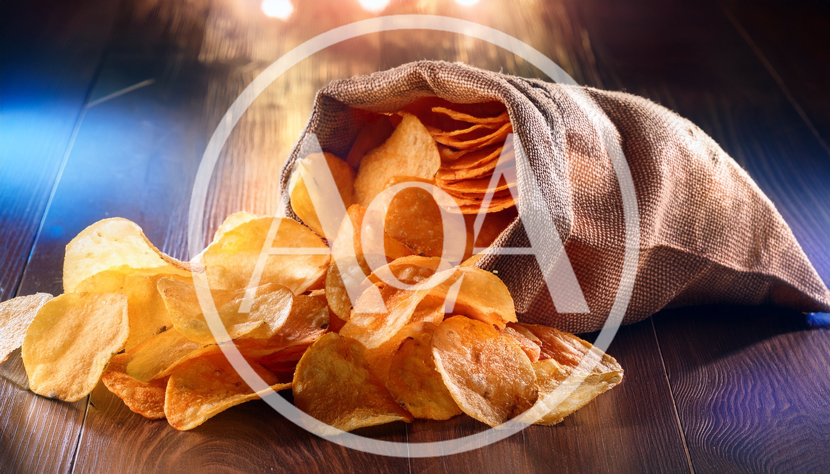 Potato Chips Spilling From A Burlap Sack