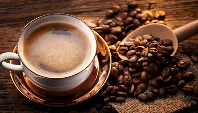 Cup Of Fresh Coffee With Roasted Coffee Beans