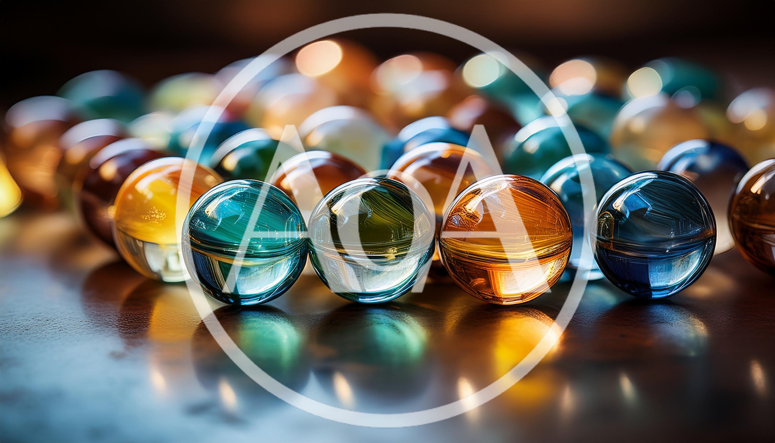 Close Up Of Colorful Glass Marbles On Wooden Surface