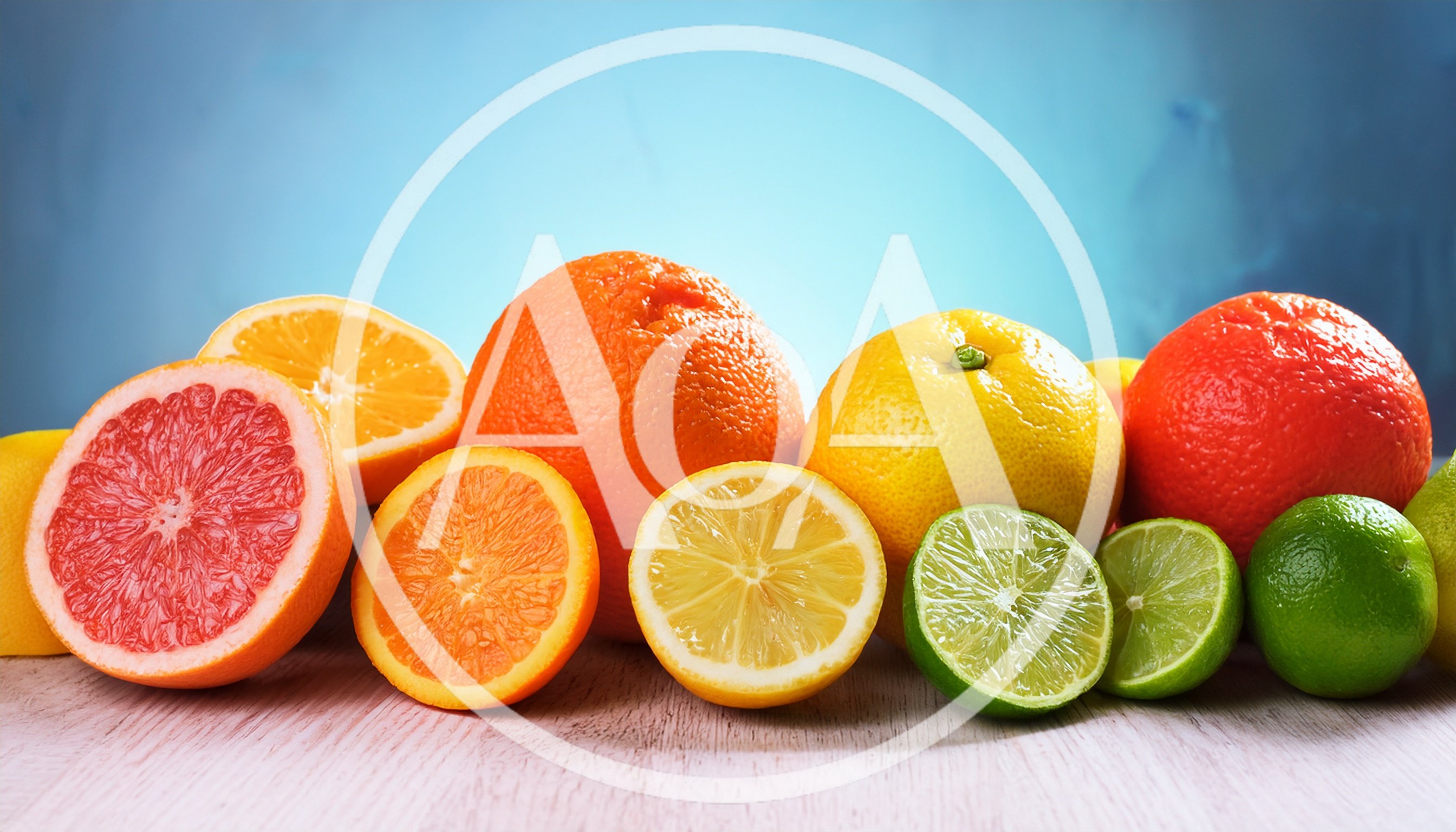 Assorted Fresh Citrus Fruits on Wooden Surface