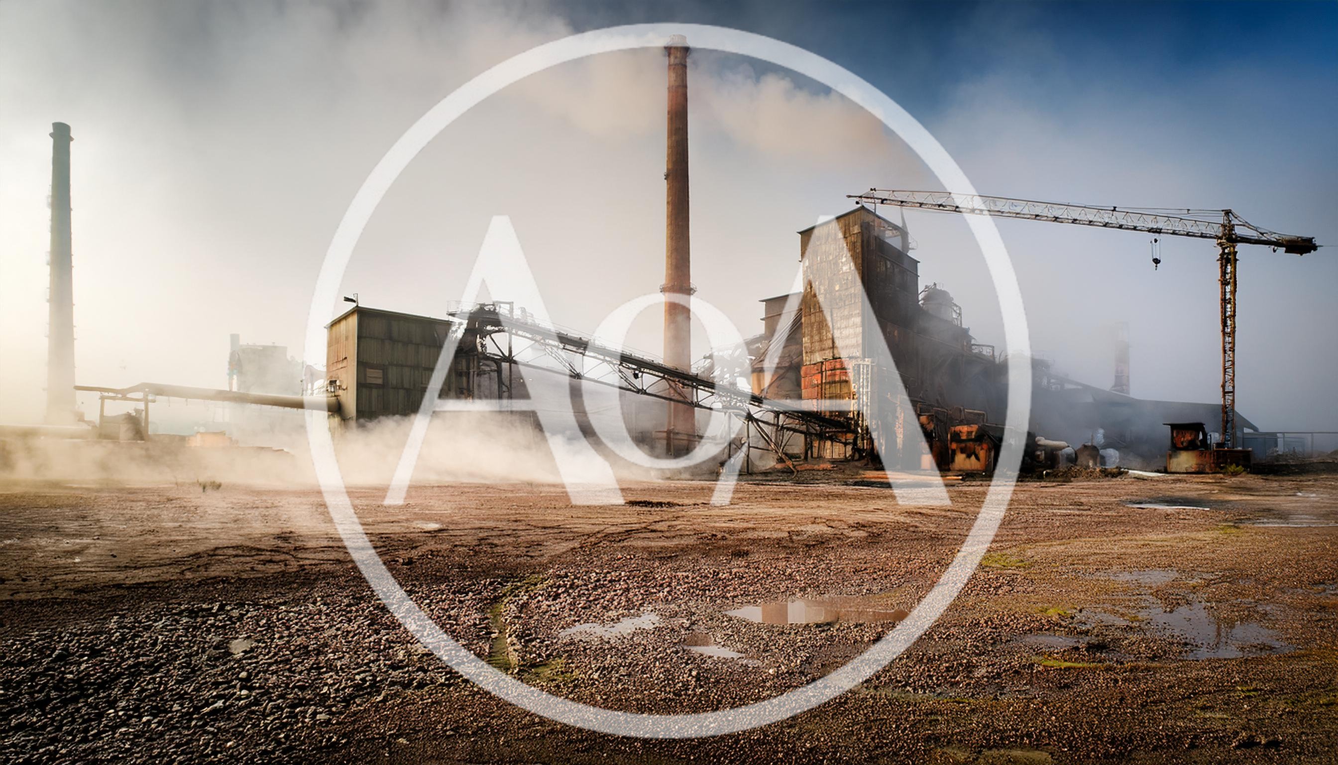 Industrial Factory Complex With Smoking Chimneys And Crane