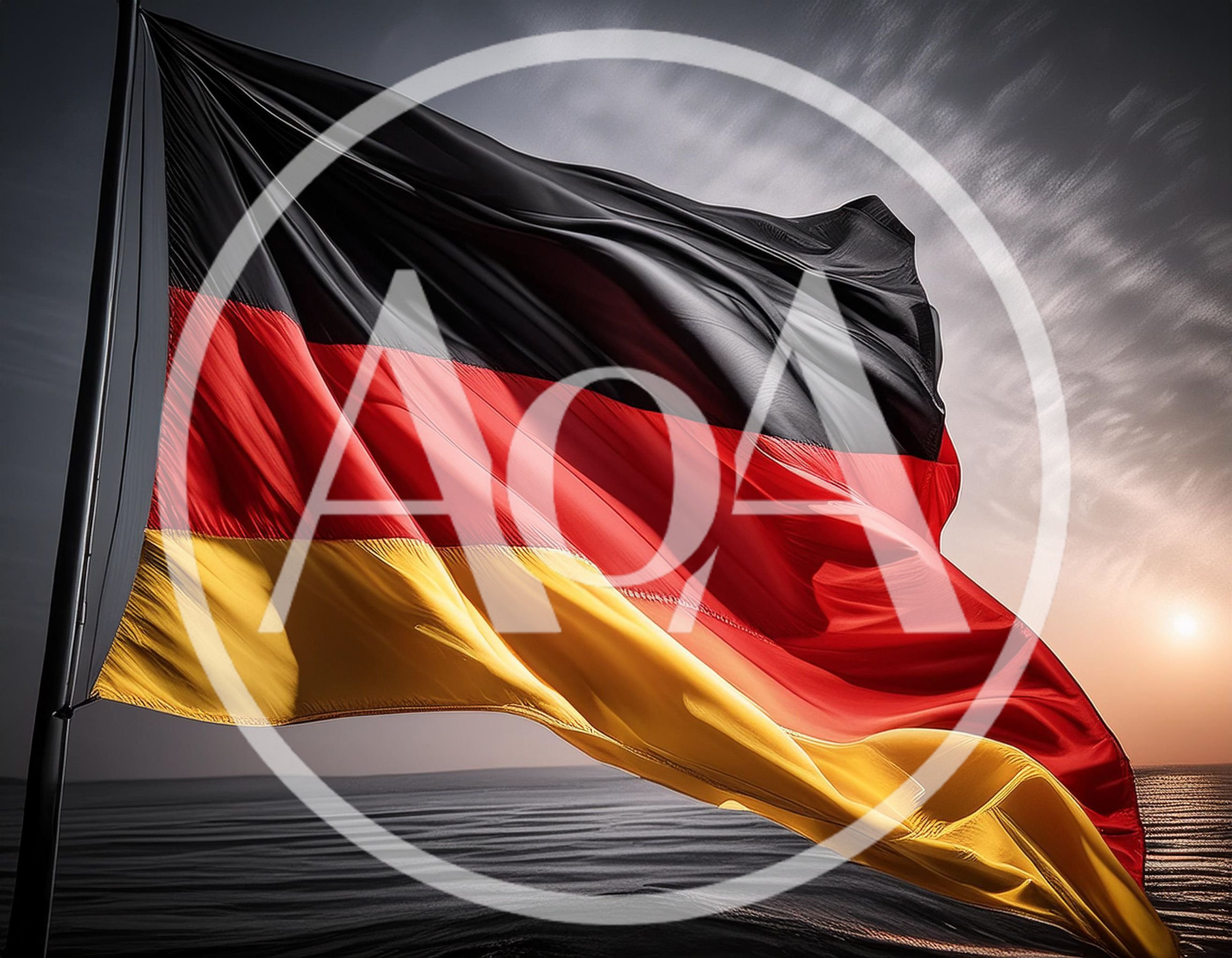 German Flag Waving Against A Dramatic Sunset Sky