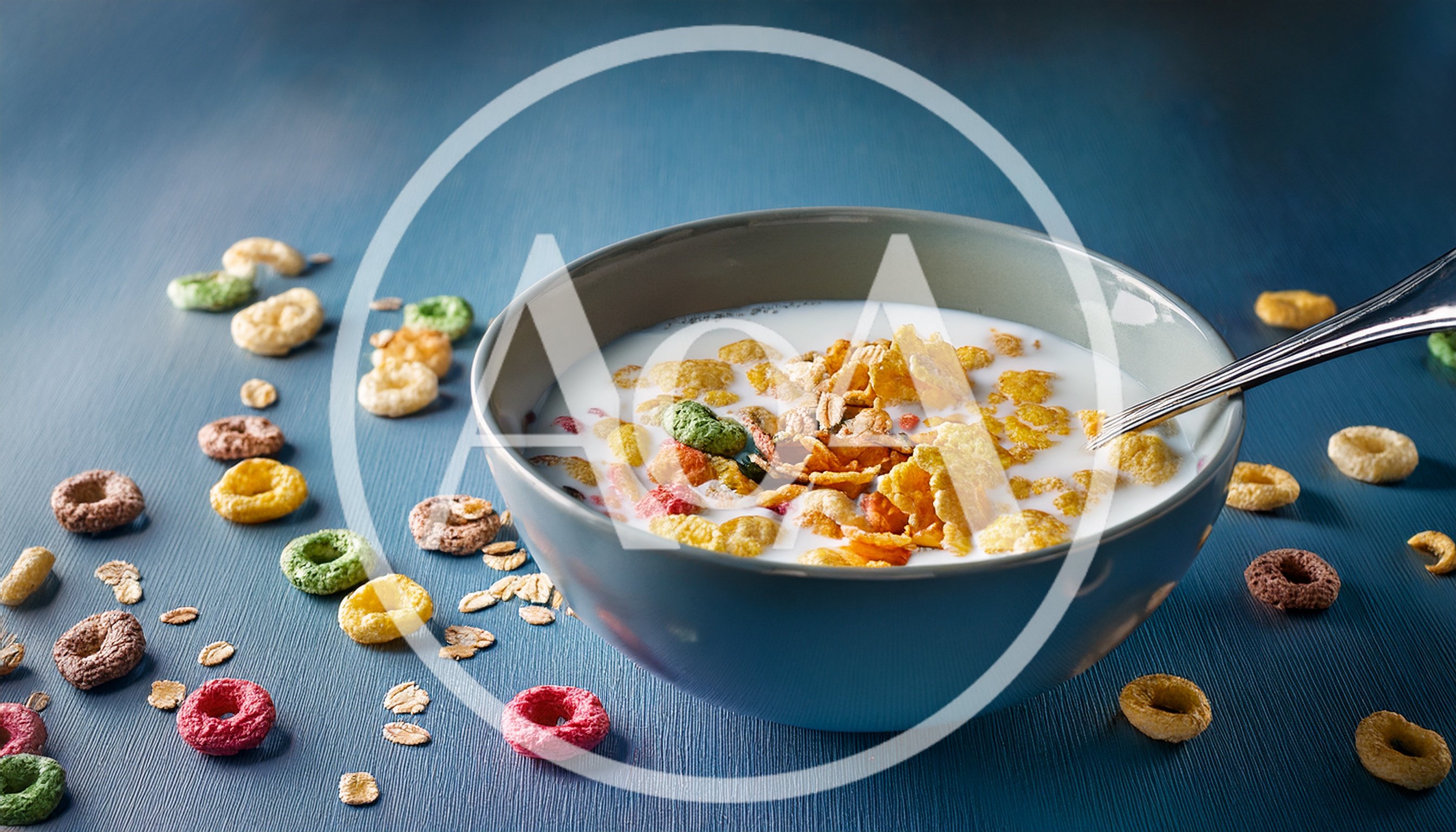 Bowl of Cereal with Milk and Scattered Loops