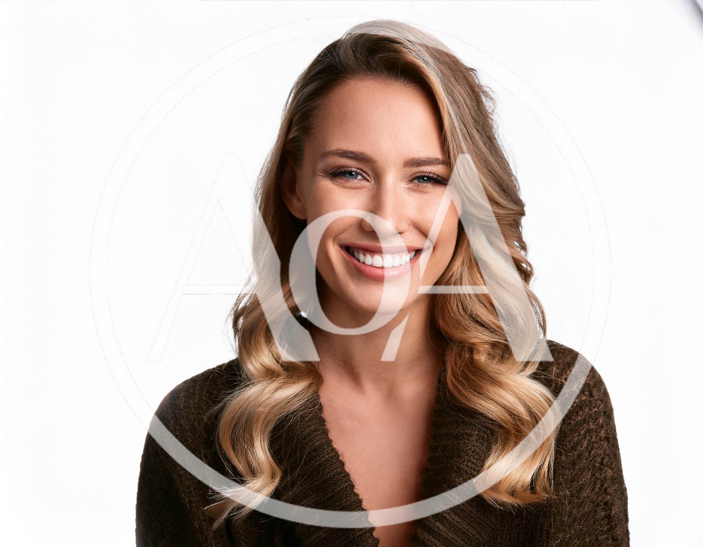 Portrait Of A Smiling Young Woman With Blonde Hair