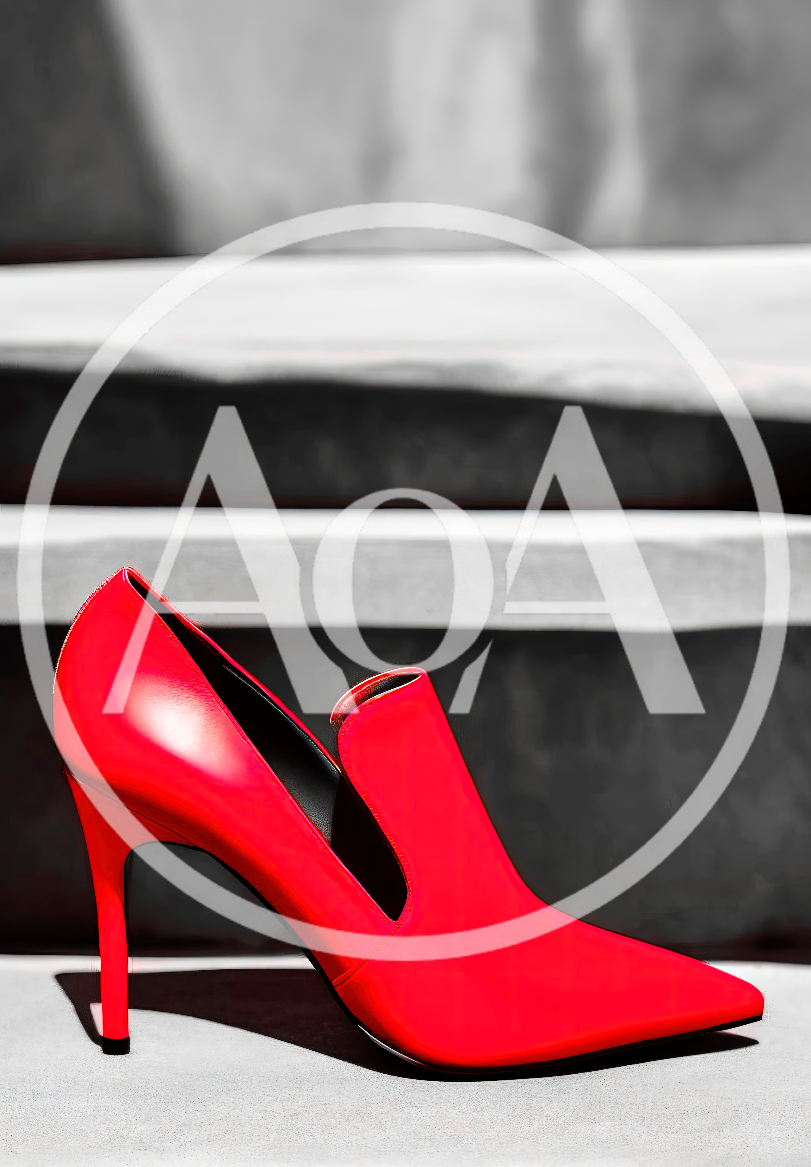 Single Red Stiletto Heel Shoe on Concrete Steps