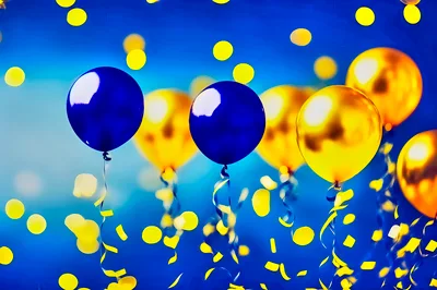 Blue and Gold Balloons Floating with Confetti