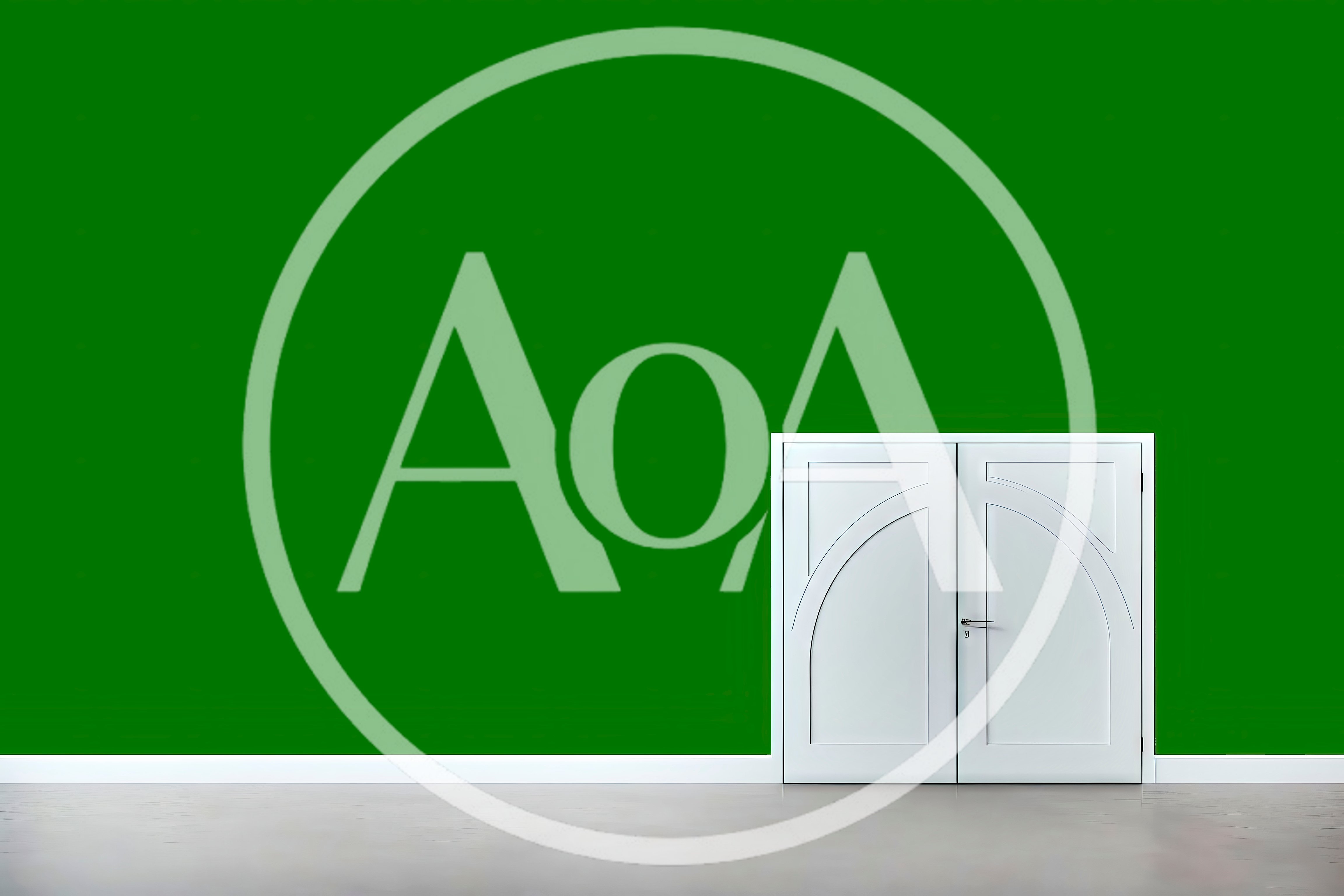 White Double Doors Against A Vibrant Green Wall