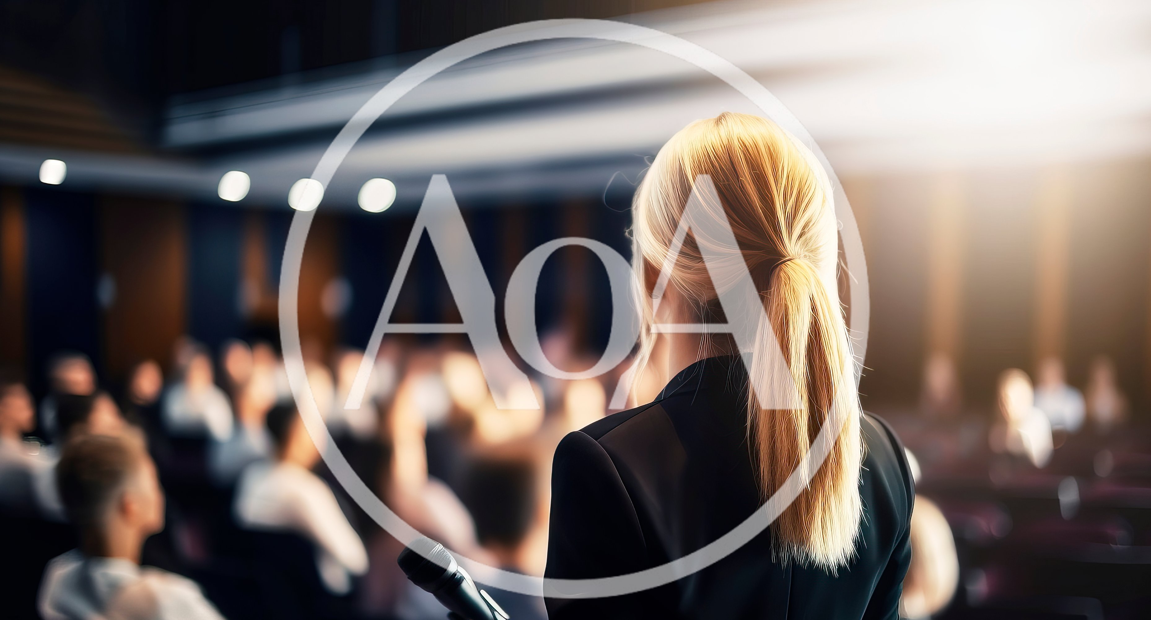 Businesswoman Giving A Presentation To An Audience