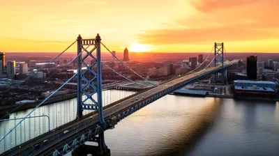 Aerial View Of Benjamin Franklin Bridge At Sunset