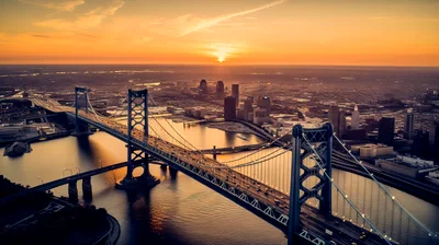 Aerial View Of Benjamin Franklin Bridge At Sunset