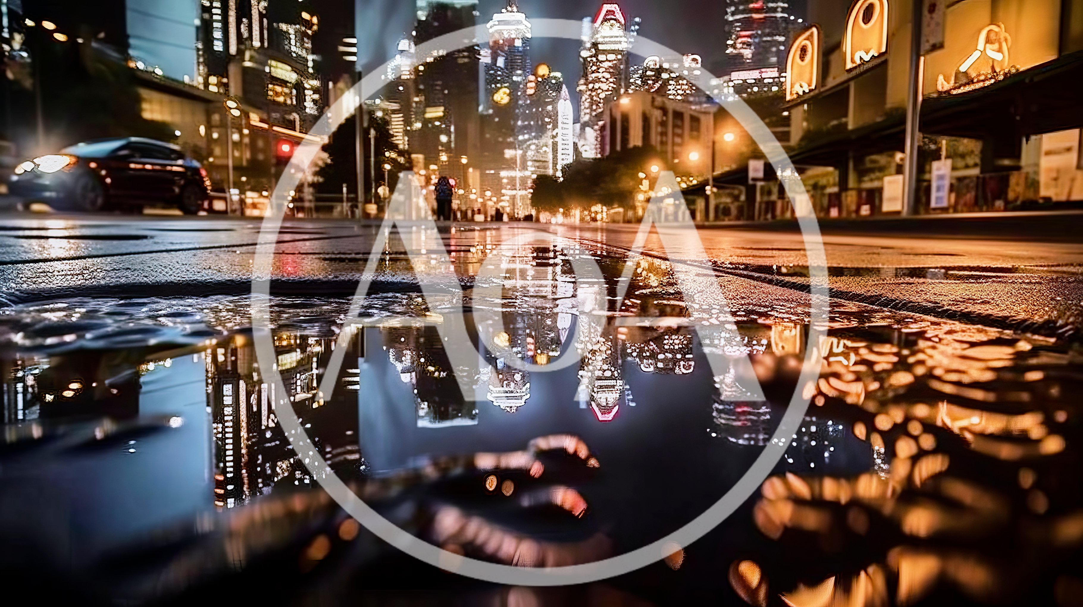 City Street Reflection In Rain Puddle At Night