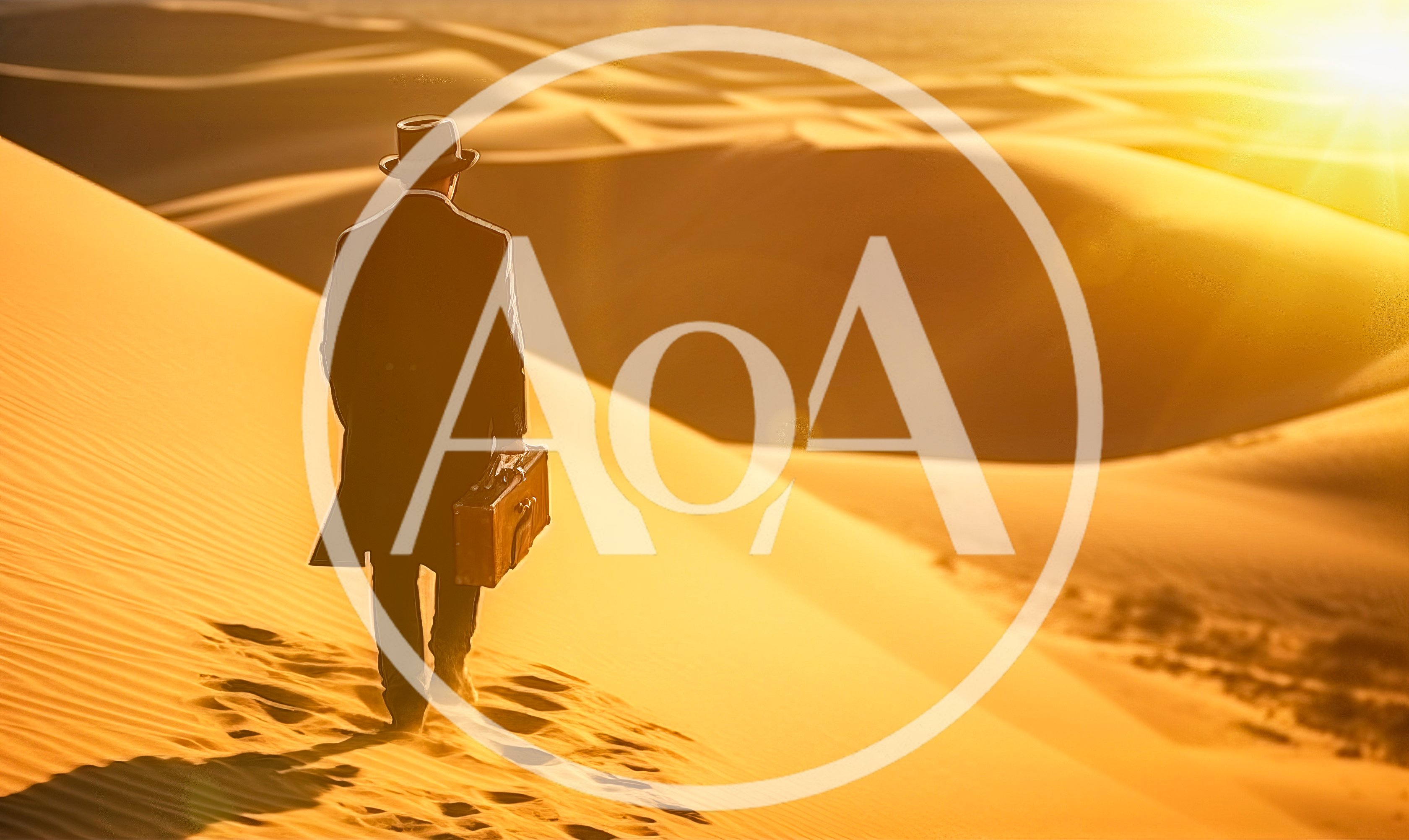 Man In Suit Walking Through Desert With Suitcase