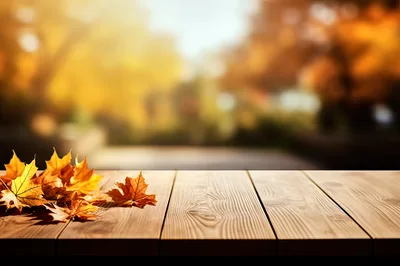 Autumn Maple Leaves On A Rustic Wooden Table
