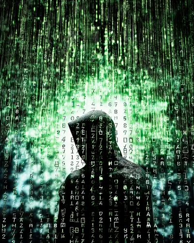 Digital Hacker Silhouette Against Matrix Style Code Rain