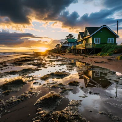 Green Beach Cottages At Sunset