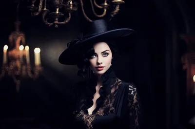 Elegant Woman In Victorian Gothic Attire And Wide Hat